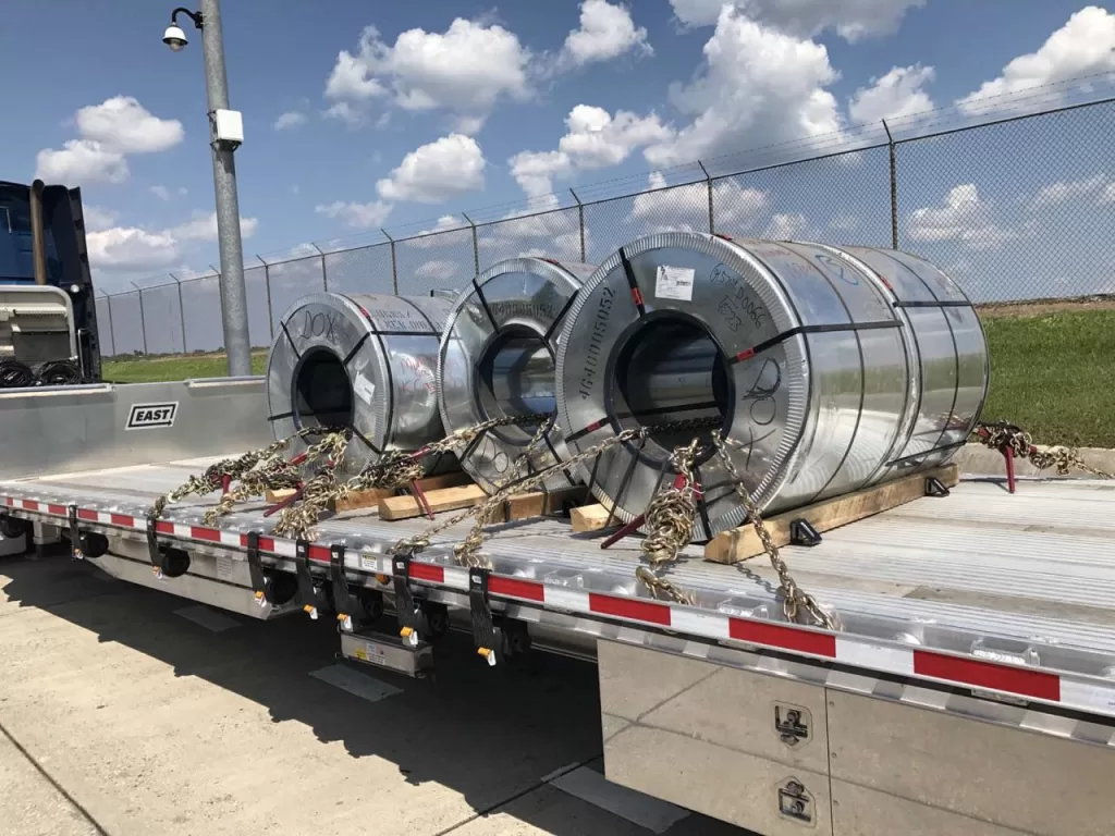 Equipment secured on a flatbed trailer