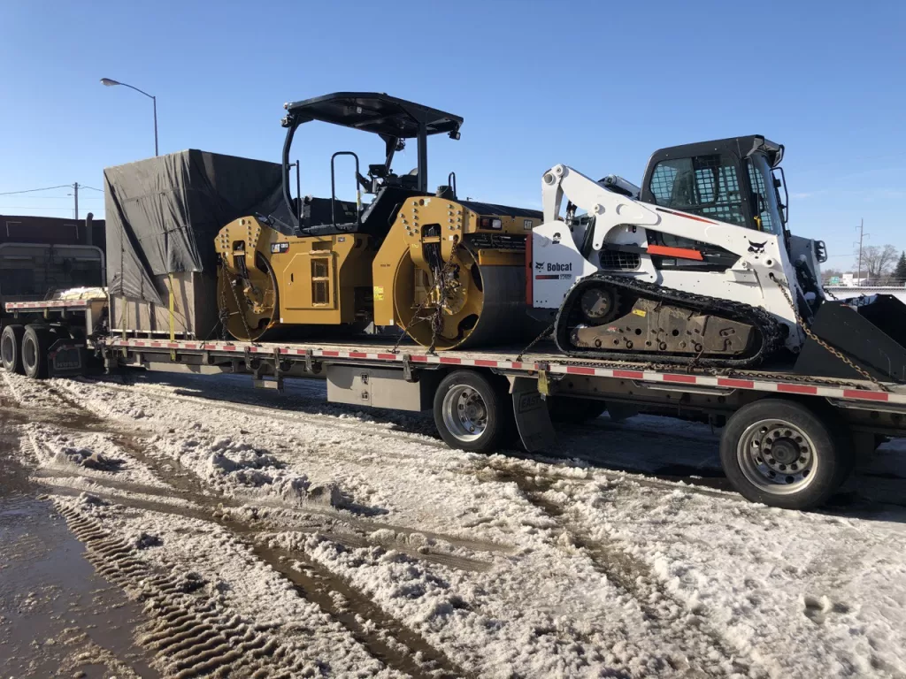DFM Trucking truck transporting a full truck load